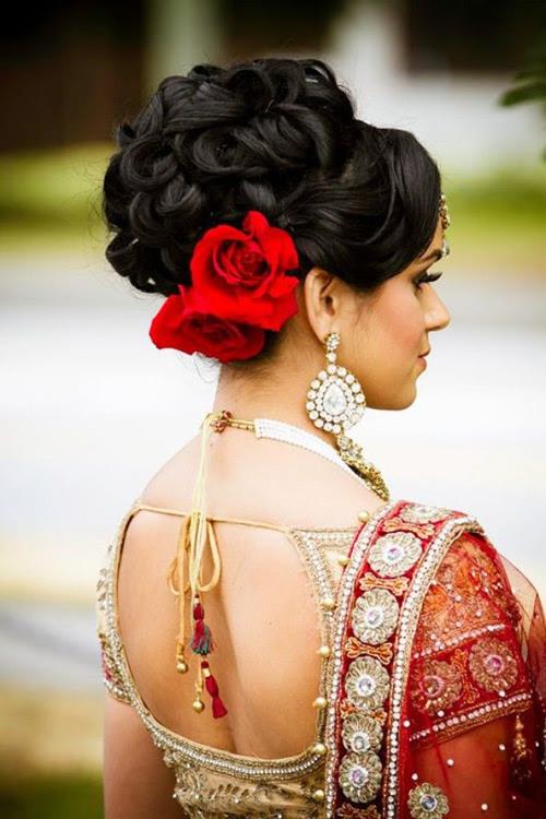 Intricate Bun Embellished With Flowers