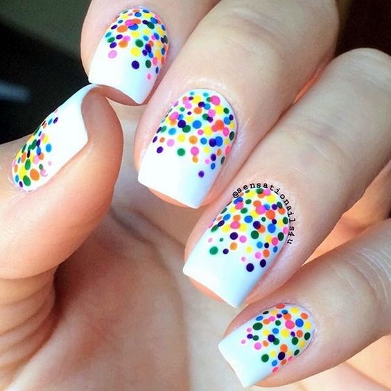 Adorable vibrant colors dots on white base nail art