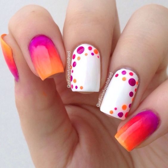 Pretty orange and pink shade and polka dots nail art