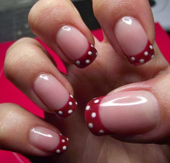 Red tips wtih white dots on french manicure