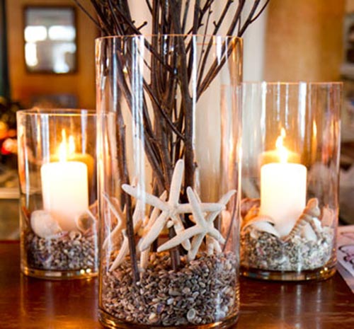 candle holder with shells and stone