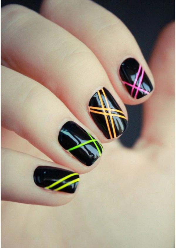 Colorful strips on black glossy nail polish