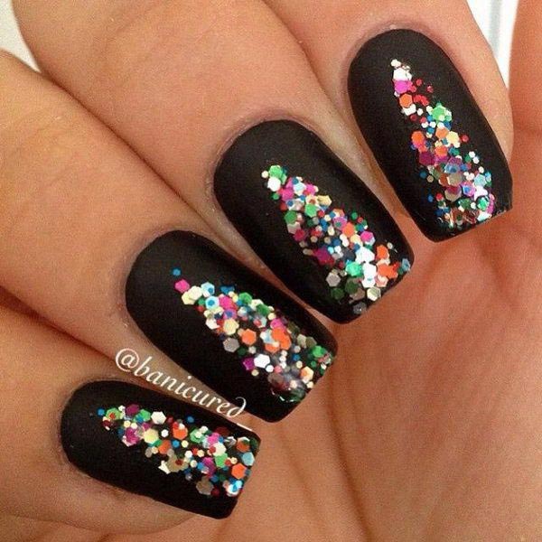 Colourful sequin design on black nails