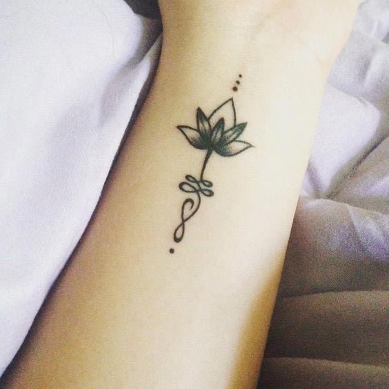 Little lotus tattoo on wrist