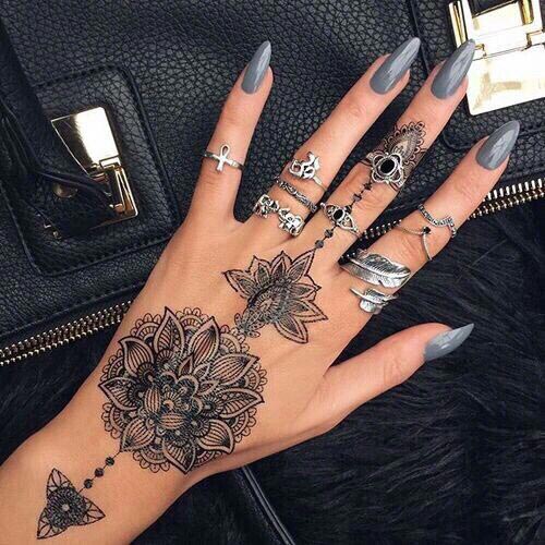 Lotus tattoo on hand