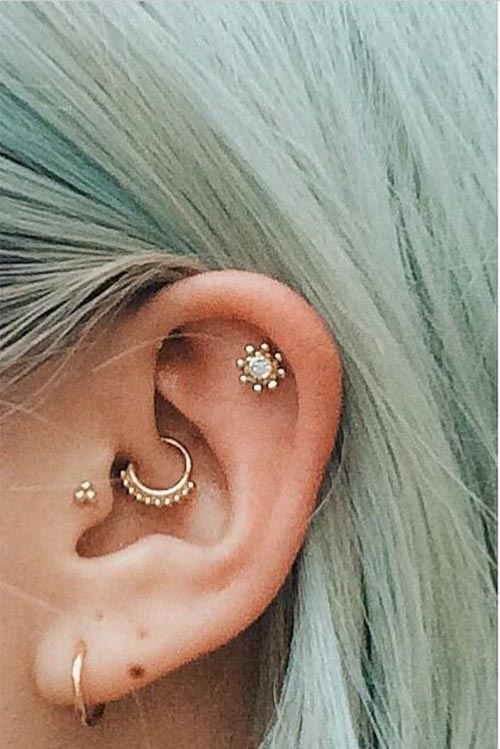 Multiple ear piercing with gold