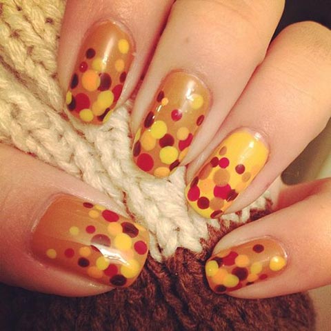 Orange polka dot nails for thanksgiving and fall