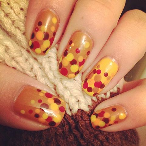 Orange polka dot nails for thanksgiving and fall