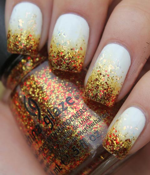 White nails with glitter in fall shades