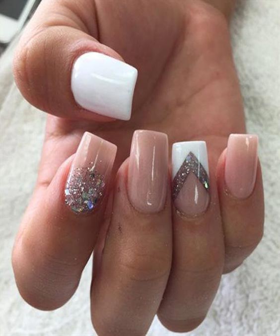 Nail art with glitter and nude