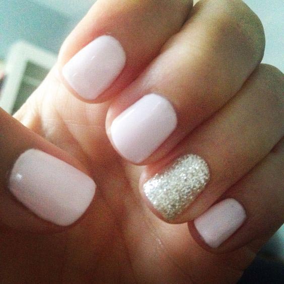 Pretty pinkish shade with sparkling gold glitter nail art