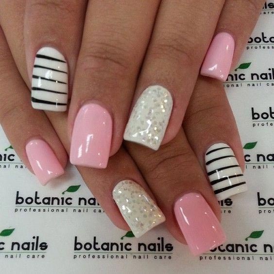 sparkling white with pink and stripes of black glitter nail art