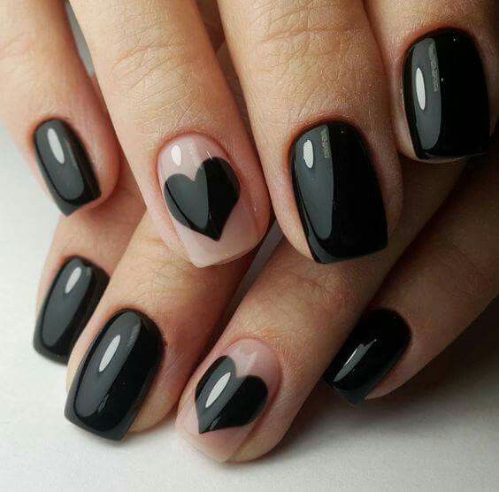 Nails with negative space and black hearts