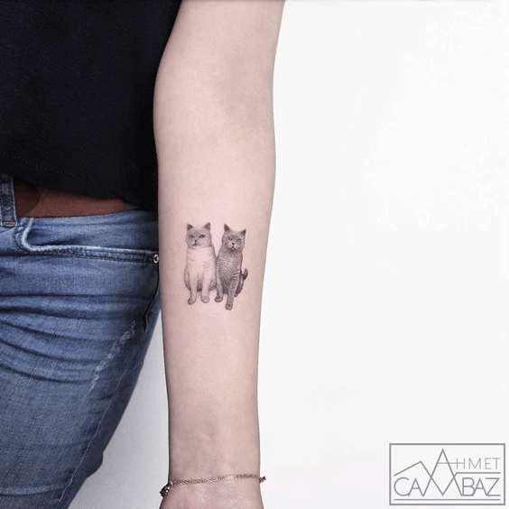 Tattoo of dear cats