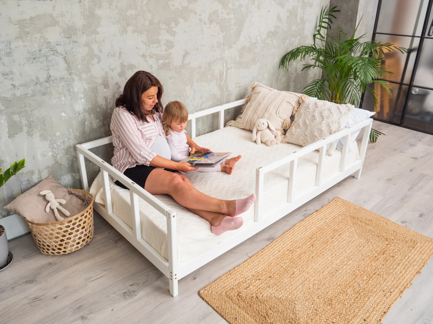 Montessori floor bed with rails in your place
