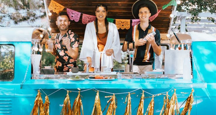 Mobile bar setup at a wedding, offering refreshments to guests.