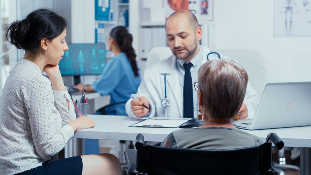 A patient consulting a healthcare professional.