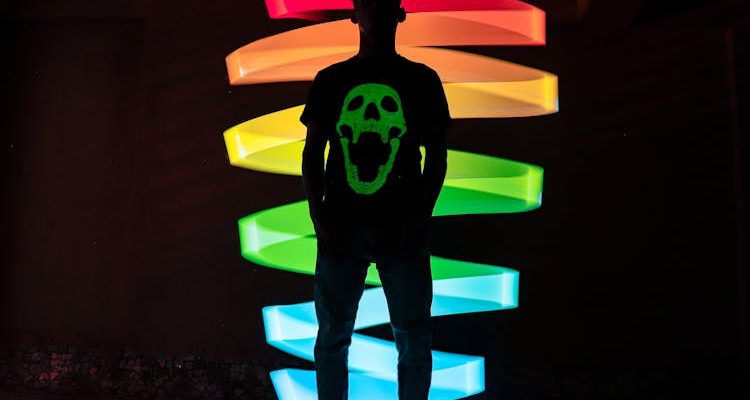 Person wearing a personalized glow shirt, showcasing unique style.