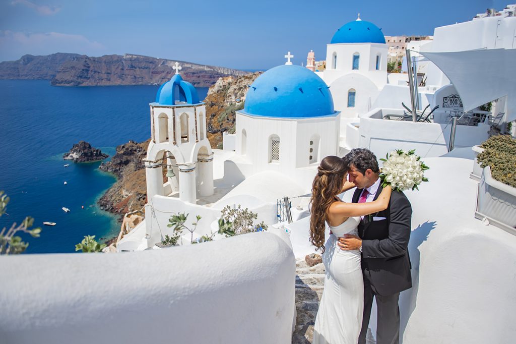 A dream wedding venue image in Santorini: A picturesque setting with stunning ocean views and white architecture