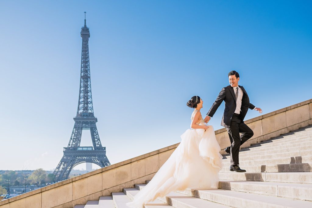 A Paris wedding: Exchanging vows in the City of Love, with iconic landmarks and romantic ambiance all around.