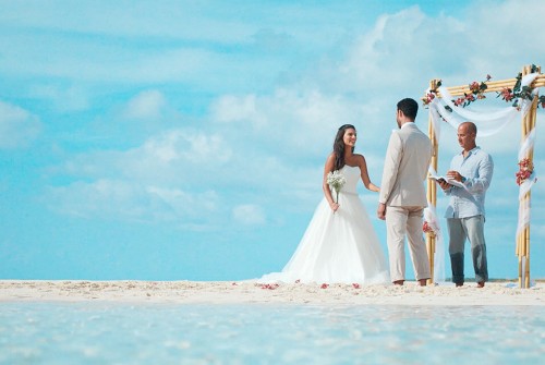 A Bahamas wedding: Tying the knot in a tropical paradise, with white sandy beaches and turquoise waters as your backdrop.
