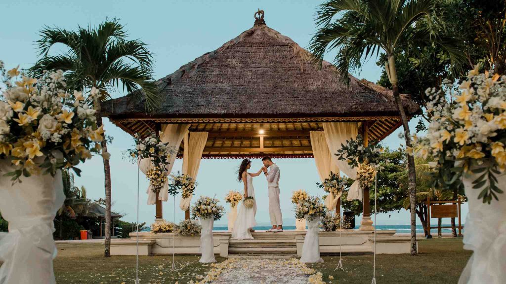 Dream wedding venues: A Bali wedding: Exchanging vows in tropical paradise, surrounded by lush greenery and serene beauty.