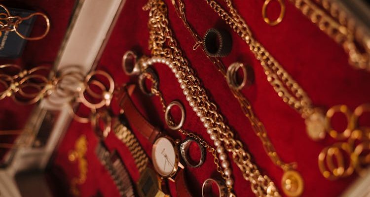 Assorted jewelry pieces displayed in a box, offering a variety of styles and options for accessorizing.