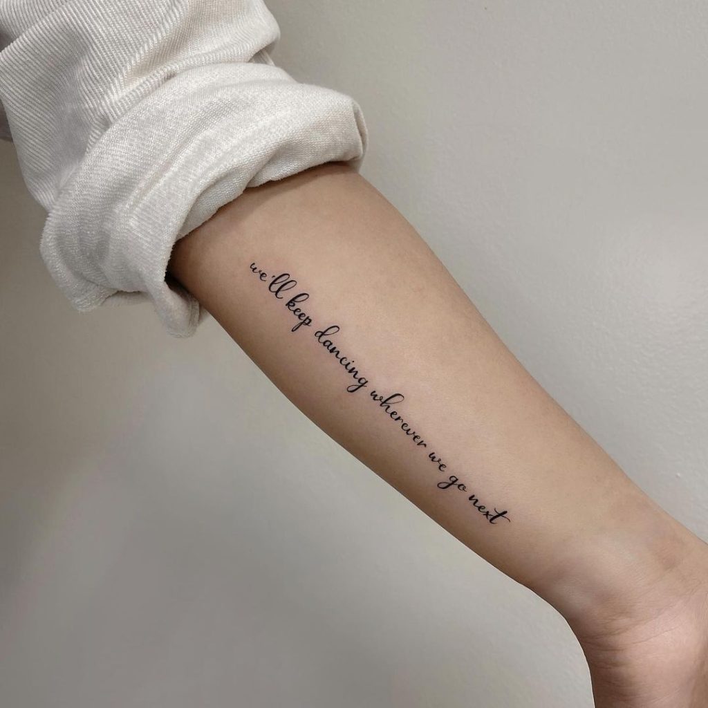 Script tattoos, a timeless choice for elegant and meaningful ink, showcasing intricate lettering or poignant phrases in a variety of styles and languages.