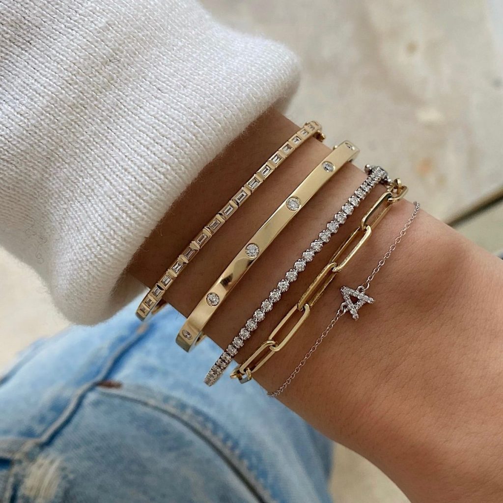 Stacked bracelets are the latest jewelry trend for a chic arm party.